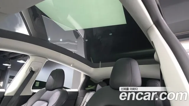 Tesla Model Y — Фото автомобиля 16