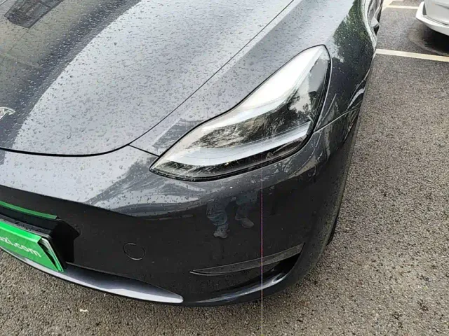 Tesla Model Y — Фото автомобиля 23
