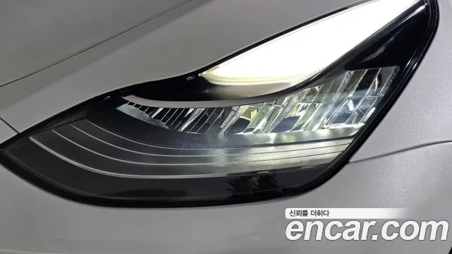 Tesla Model Y — Фото автомобиля 7