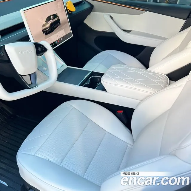 Tesla Model Y — Фото автомобиля 5