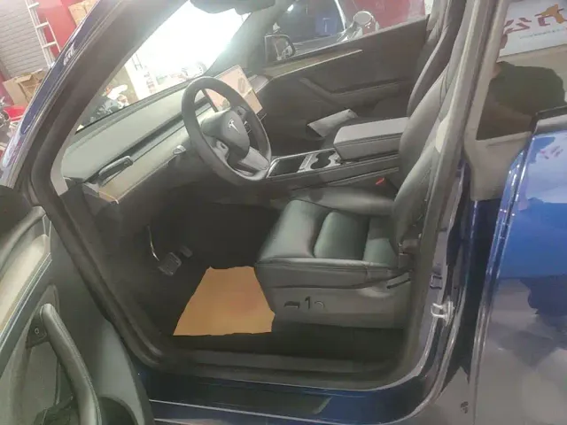 Tesla Model Y — Фото автомобиля 14