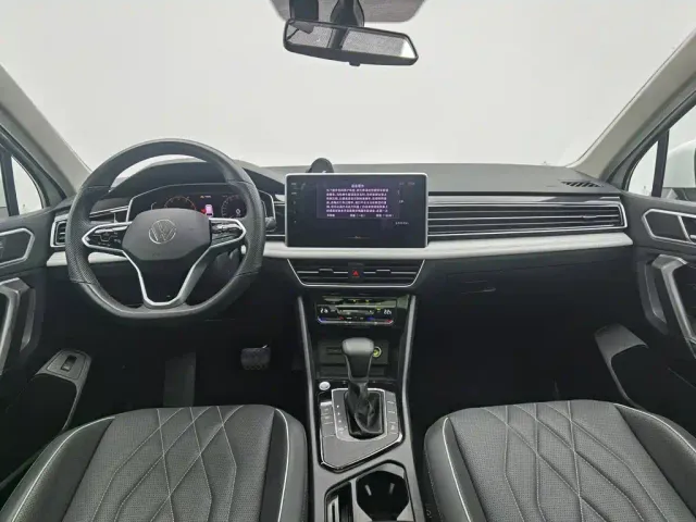 Volkswagen Tiguan L — Фото автомобиля 5
