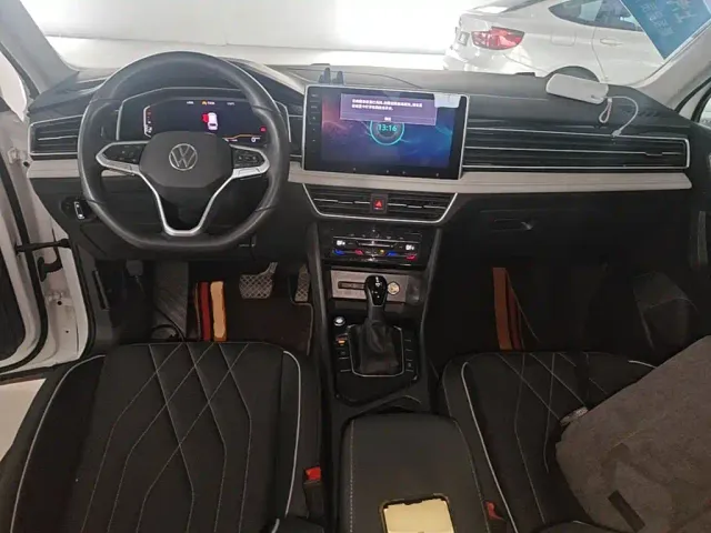 Volkswagen Tiguan L — Фото автомобиля 9