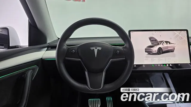 Tesla Model Y — Фото автомобиля 19