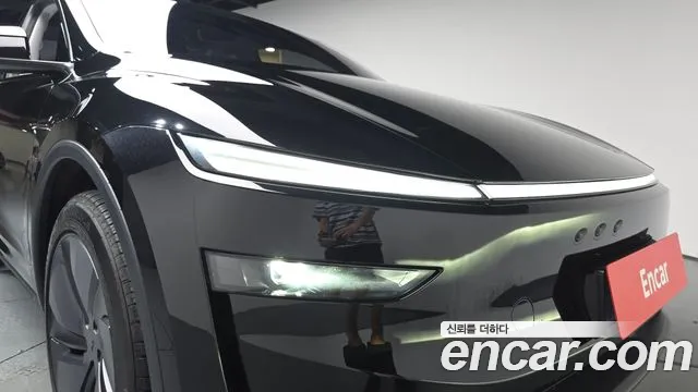 Tesla Model Y — Фото автомобиля 22