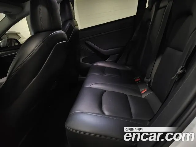 Tesla Model 3 — Фото автомобиля 9