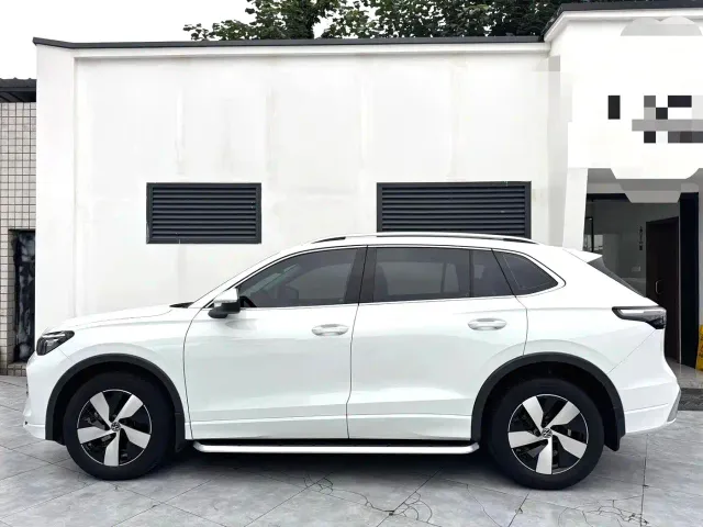 Volkswagen Tiguan L — Фото автомобиля 7