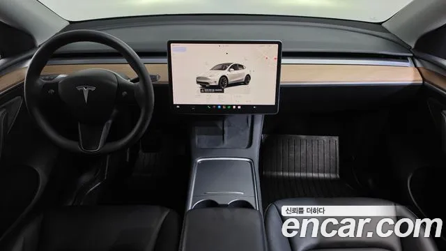 Tesla Model Y — Фото автомобиля 7