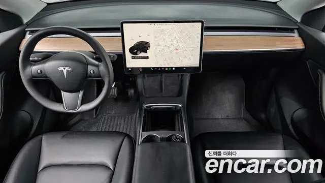 Tesla Model Y — Фото автомобиля 7