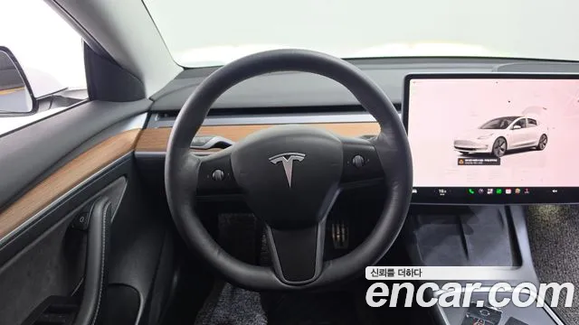 Tesla Model 3 — Фото автомобиля 14