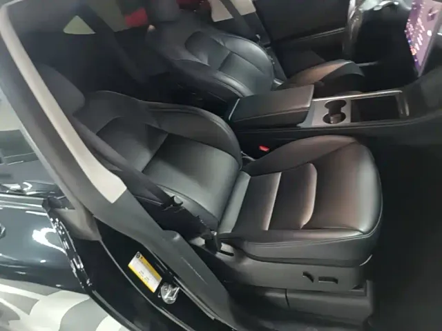 Tesla Model Y — Фото автомобиля 24
