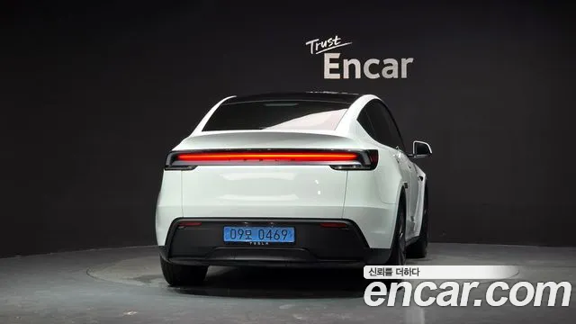 Tesla Model Y — Фото автомобиля 4