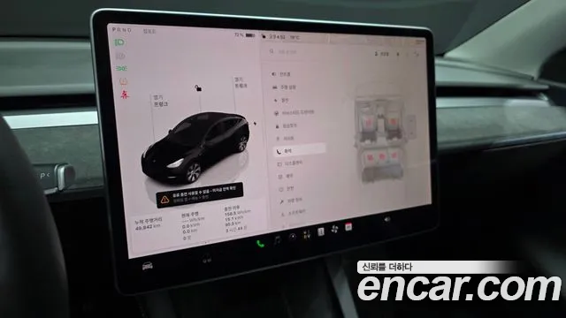 Tesla Model Y — Фото автомобиля 22