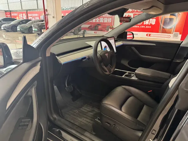 Tesla Model Y — Фото автомобиля 7