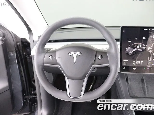 Tesla Model Y — Фото автомобиля 11
