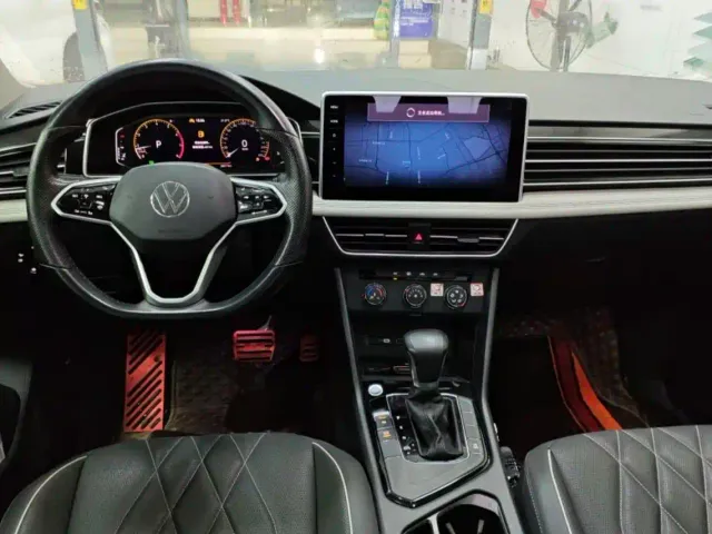 Volkswagen Tiguan L — Фото автомобиля 10