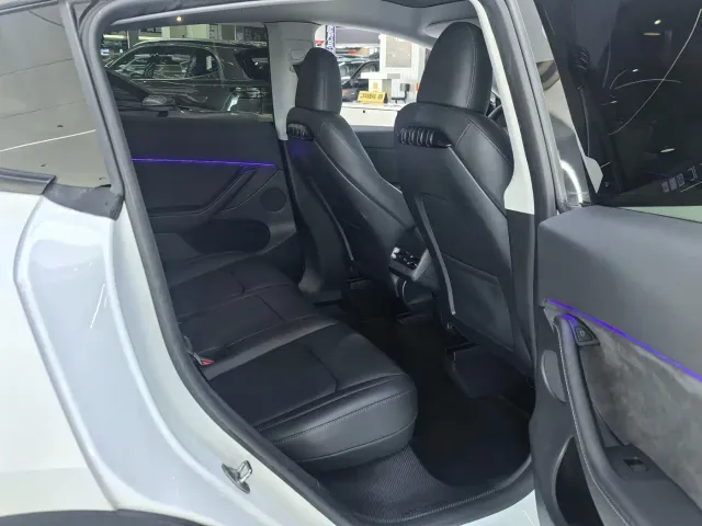Tesla Model Y — Фото автомобиля 11