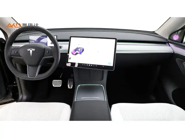 Tesla Model Y — Фото автомобиля 5