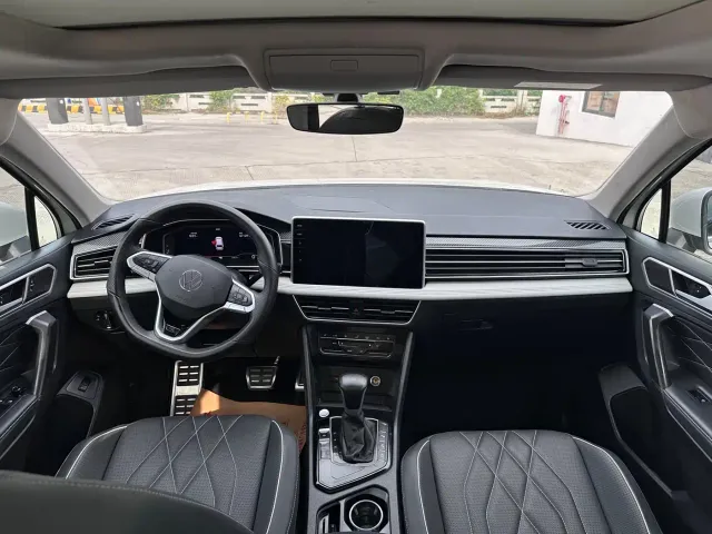 Volkswagen Tiguan L — Фото автомобиля 6
