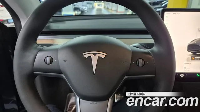 Tesla Model Y — Фото автомобиля 9
