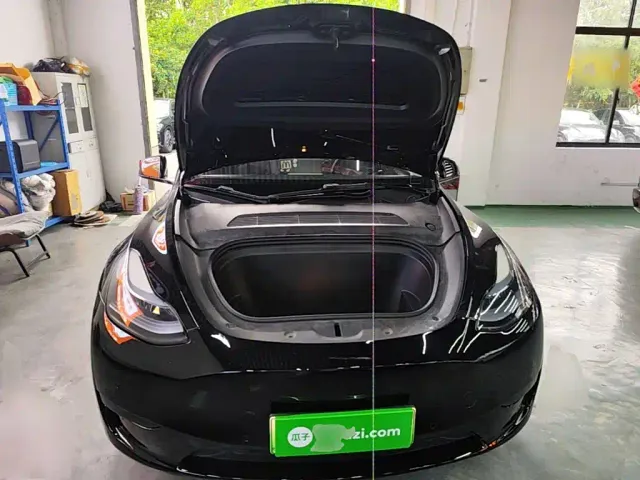 Tesla Model Y — Фото автомобиля 19