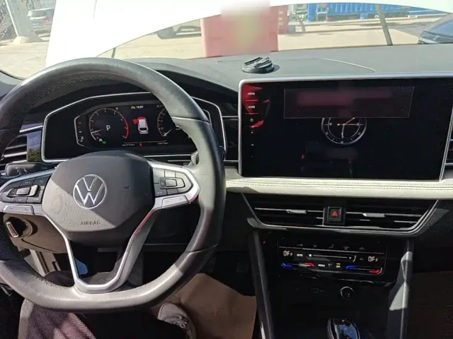 Volkswagen Tiguan L — Фото автомобиля 9