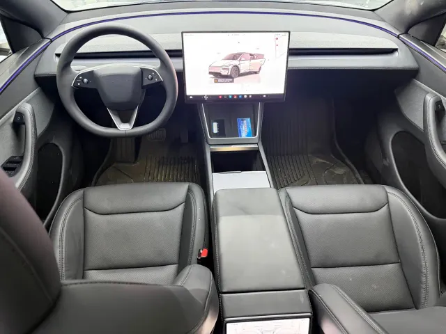 Tesla Model Y — Фото автомобиля 13