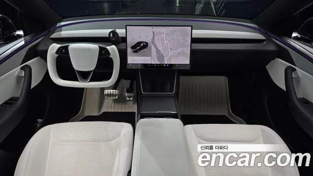 Tesla Model Y — Фото автомобиля 7