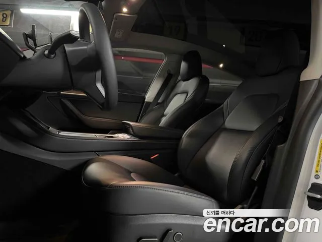Tesla Model Y — Фото автомобиля 18