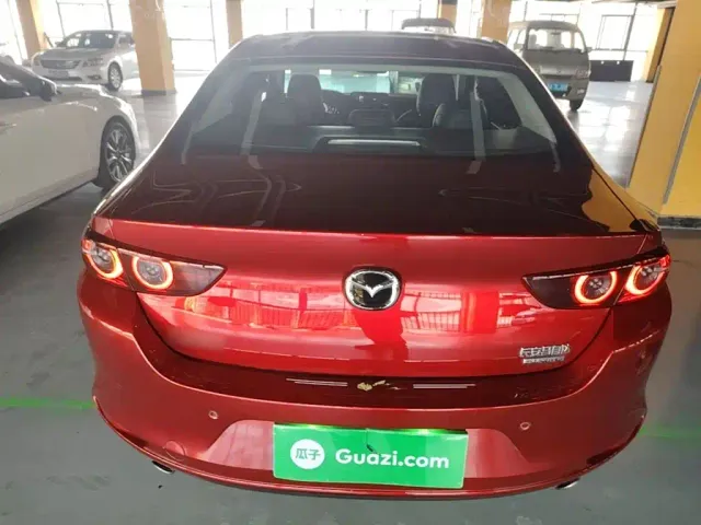 Mazda Axela — Фото автомобиля 5