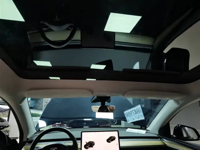 Tesla Model Y — Фото автомобиля 13