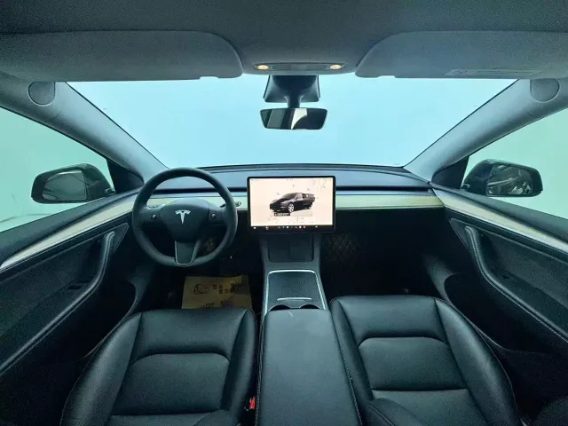 Tesla Model Y — Фото автомобиля 7