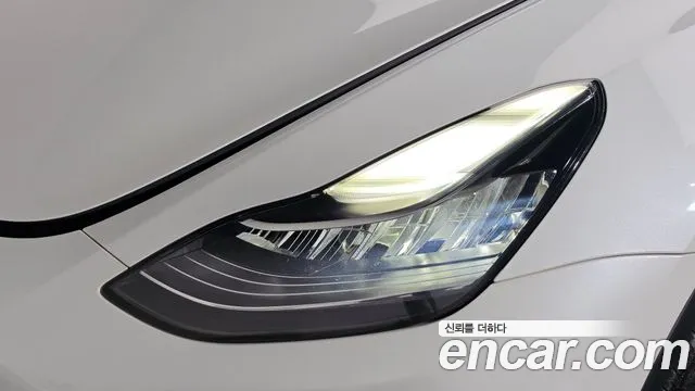 Tesla Model Y — Фото автомобиля 7