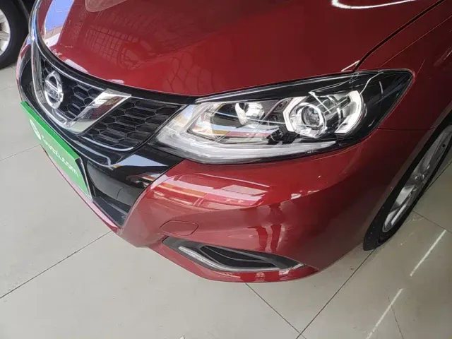 Nissan Tiida — Фото автомобиля 23