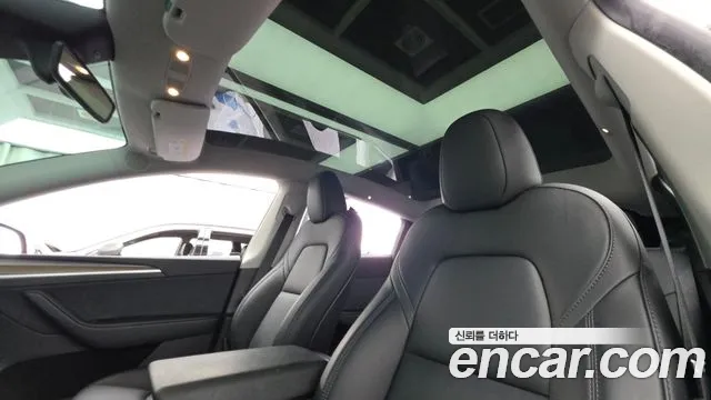 Tesla Model Y — Фото автомобиля 18