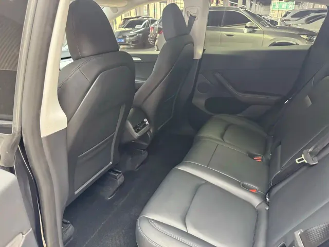 Tesla Model Y — Фото автомобиля 6