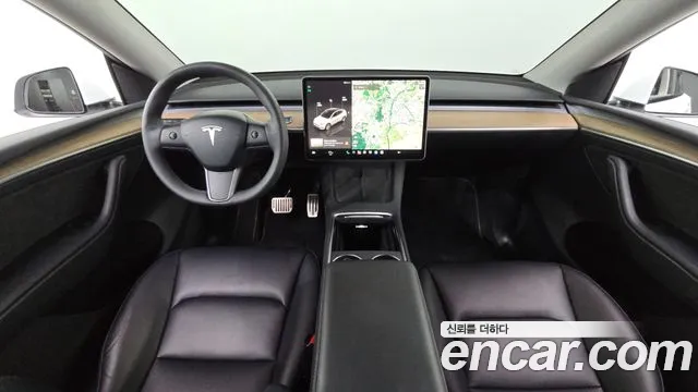Tesla Model Y — Фото автомобиля 10