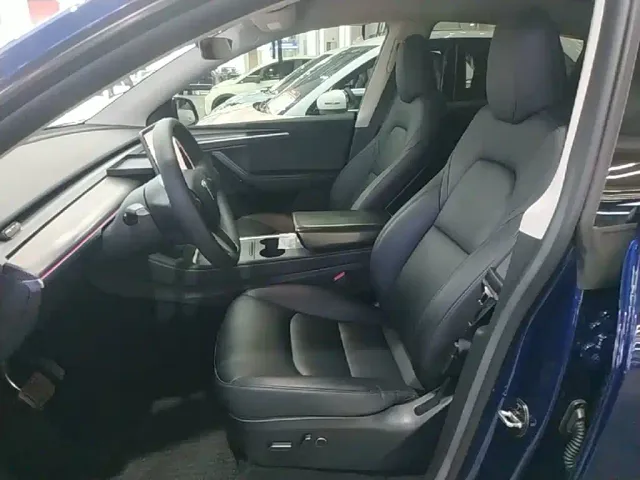 Tesla Model Y — Фото автомобиля 14