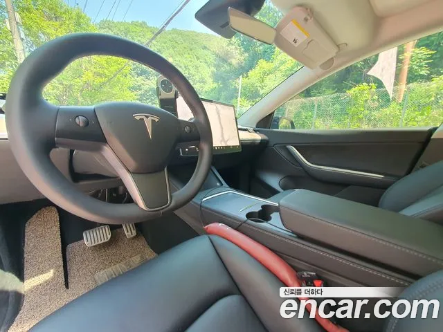 Tesla Model Y — Фото автомобиля 8
