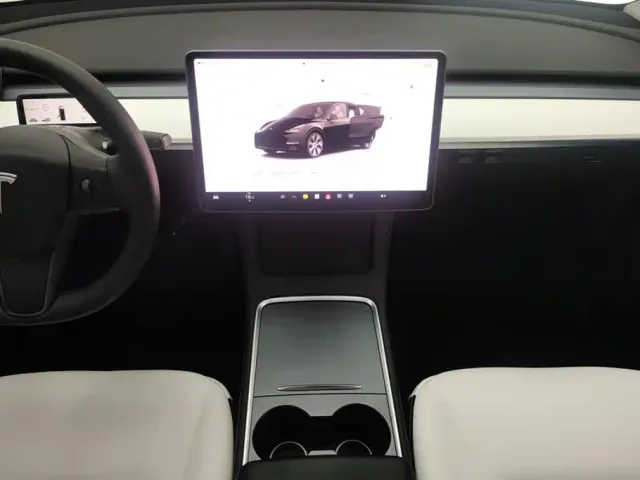 Tesla Model Y — Фото автомобиля 16