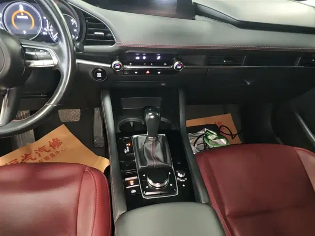 Mazda Axela — Фото автомобиля 13