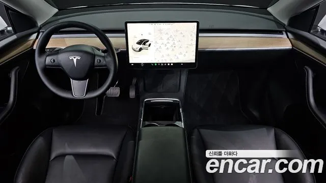 Tesla Model Y — Фото автомобиля 7
