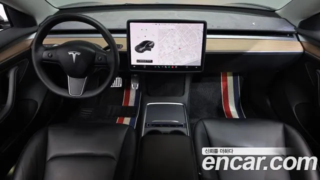 Tesla Model 3 — Фото автомобиля 10