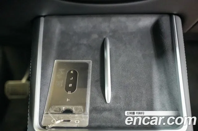 Tesla Model Y — Фото автомобиля 12