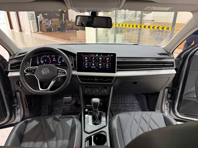 Volkswagen Tiguan L — Фото автомобиля 12