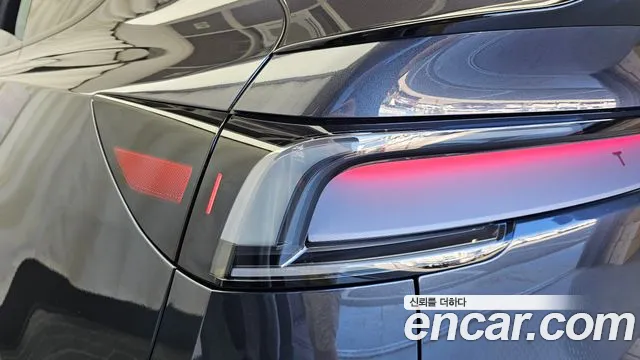 Tesla Model Y — Фото автомобиля 4