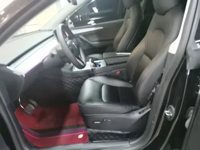 Tesla Model Y — Фото автомобиля 14
