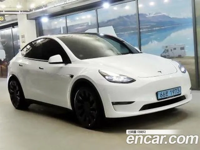 Tesla Model Y — Фото автомобиля 2