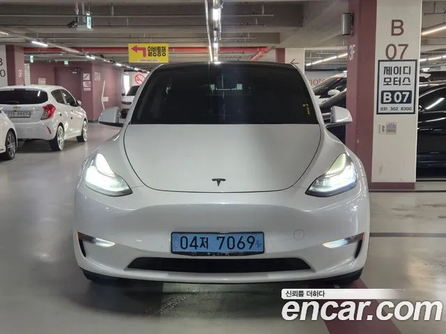 Tesla Model Y — Фото автомобиля 2