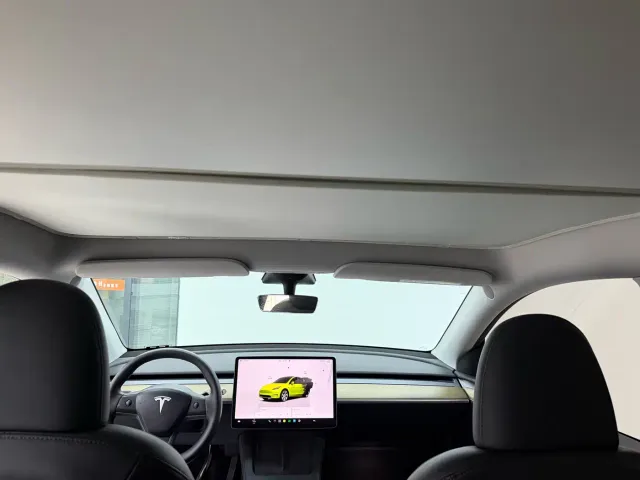 Tesla Model Y — Фото автомобиля 19